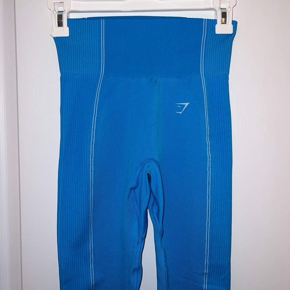 Bright blue gym shark workout leggings for sale in a size small!